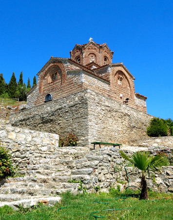 The old stone church against vivid blue sky, Saint John at Kaneo's church of Ohrid in Republic of Macedoniaの写真素材
