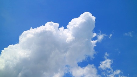 Fluffy White Cloud on the Vivid Blue Tropical Sunny Sky, Bangkok, Thailandの写真素材