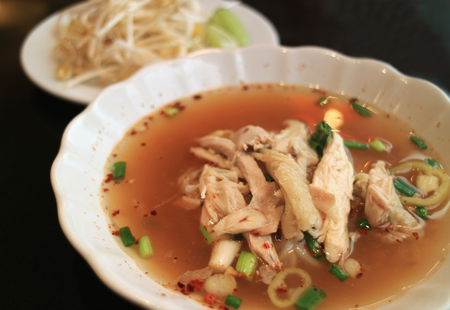 Spicy Thai Soup Noodle With Steamed Chicken Served Fresh With Bean Sprouts