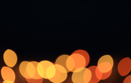 Blurred, Out of focus, Bokeh, Defocused Yellow and Orange Color Light in the Dark, Abstract...