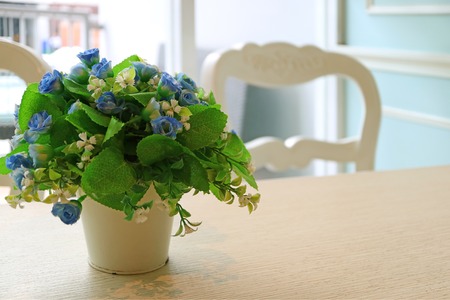 Beautiful Flower Vase on the Dining Table, with Blurred Backgroundの写真素材