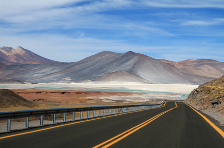 The road to Salar de Talar, beautiful highland salt flats and salt lakes in northern Chileの写真素材
