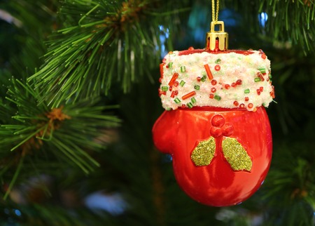 Mini Santa Claus Red Glove Ceramic Ornament Hanging on the Christmas Treeの写真素材