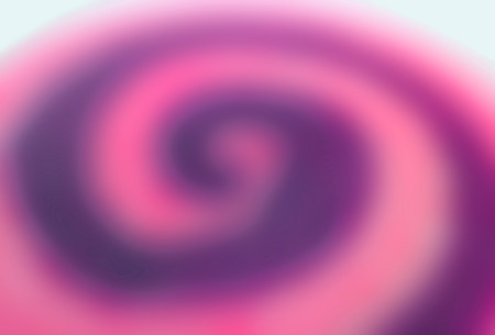 Abstract blurred pink and purple colored spiral pattern of a yummy candyの写真素材