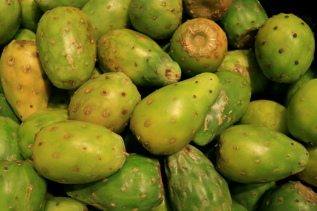 Pile of Green Nopal Cactus Fruits for Sale in the Supermarket of Santiago of Chile, South Americaの写真素材