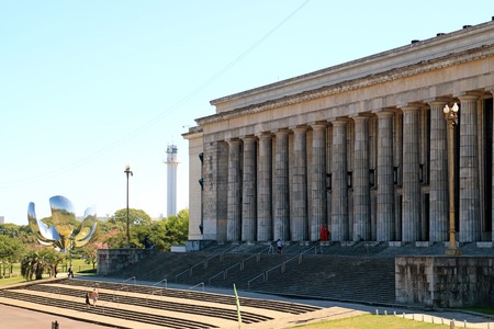 Neoclassical Building of University of Buenos Aires Faculty of Law with Famous Steel Flower Floralis Generica in Background, Buenos Aires, Argentinaのeditorial素材