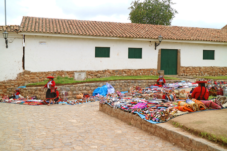 Local People Walking at Traditional Market at the Hilltop Town Plaza of Chinchero, Cuzco, Peruのeditorial素材