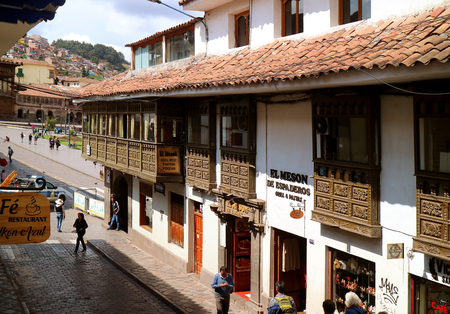 Alley from Plaza de Armas full of shops and cafes in Peruvian traditional old buildings, Cusco, Peruのeditorial素材