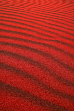 Vertical image of pop art styled desert sand ripple patterns for wallpaper or backdropの写真素材