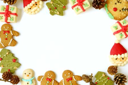 Delectable Picture Frame of Variety of Christmas Cookies on White Background with Copy Spaceの写真素材