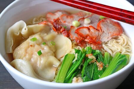 Closeup Wonton Dumpling with Roasted Pork and Egg Noodle Soup