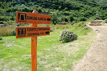 Sign for the location of the ancient ruins in Tipon archaeological park, Sacred Valley of the Inca, Cuzco region, Peruの写真素材