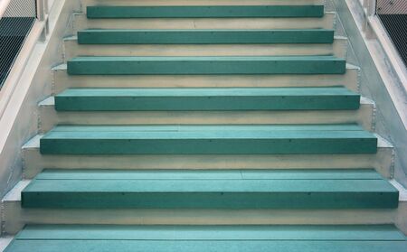 Empty blue and white staircase in a modern buildingの写真素材