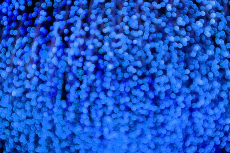 Abstract Blurred Neon Green Illuminated Decorative Lights for Background or Wallpaperの写真素材