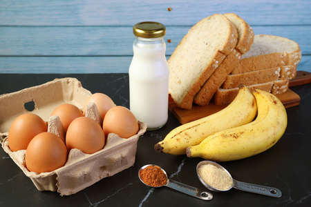 Ingredients for Easy and Healthy Homemade Banana Bread Pudding on Kitchen Tableの写真素材