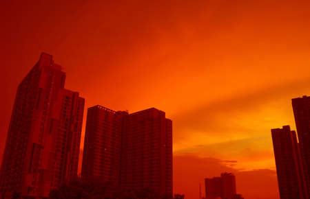 City skyline at sunset in pop art style vivid orange red colorの写真素材