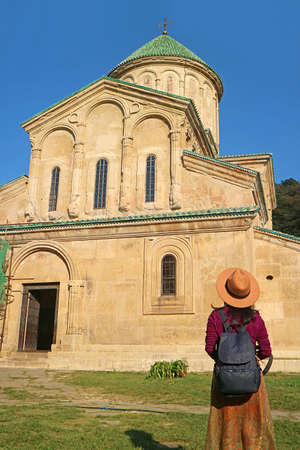 Female Visitor Looking at the Medieval Church in Gelati Monastery Complex