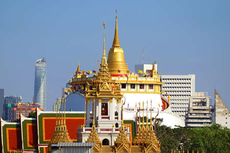 Incredible View of the Top of Loha Prasat (Iron Castle) of Wat Ratchanatdaram Temple and Phu Khao Thong (Golden Mount) of Wat Saket Temple Bangkok City Skyline, Thailandのeditorial素材