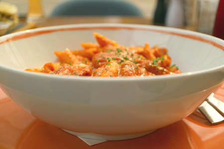 Bowl of Penne Pasta with Shrimp and Spicy Arrabbiata Sauceの写真素材