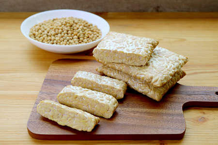 Tempeh or tempe made from fermented soybeans, a source of high plant-based protein and fiberの写真素材