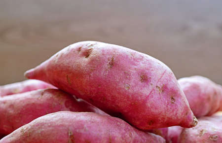 Closeup of Raw Sweet Potato on a Pileの写真素材