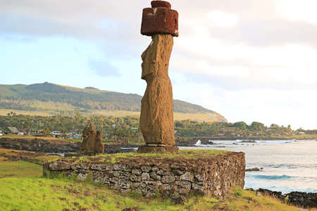 Massive Moai Statue with Pukao (Hat) of Ahu Ko Te Riku Ceremonial Platform on the Pacific West Coast, Easter Island, Chileのeditorial素材