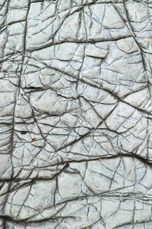 Artistic Texture of Weathered Stone Surface for Backdrop or Banner