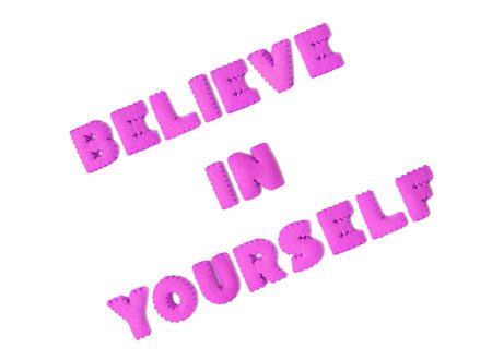 Text of encouragement spelled with purple alphabet shaped cookies on transparent background, png fileの写真素材