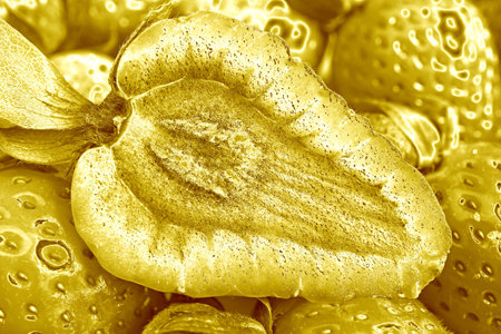 Pop Art Surreal Style Yellow Gold Colored Strawberries Cross Sectionの写真素材