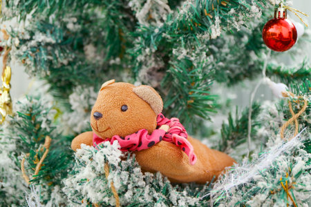 Adorable Squirrel Soft Toy on a Snow Covered Christmas Tree