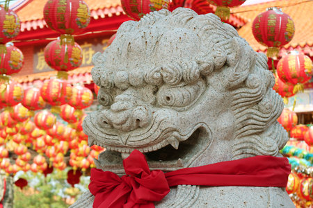 Amazing Chinese Guardian Lion Sculpture in the Chinese Buddhist Templeの写真素材