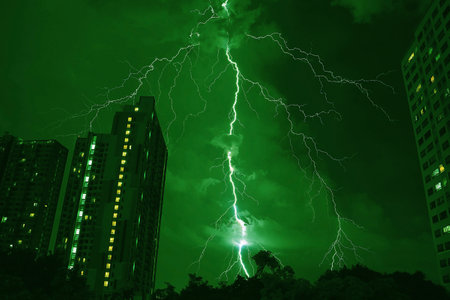 Surreal Pop Art of Incredible Lightning Strikes in Emerald Green Urban Night Skyの写真素材