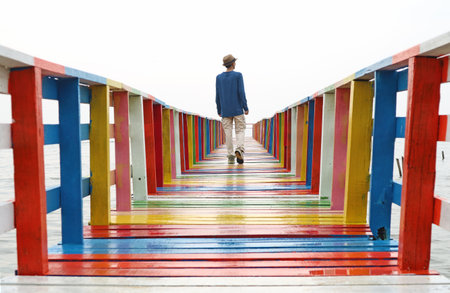 People Walking on the Multi Colored Wooden Pierの写真素材