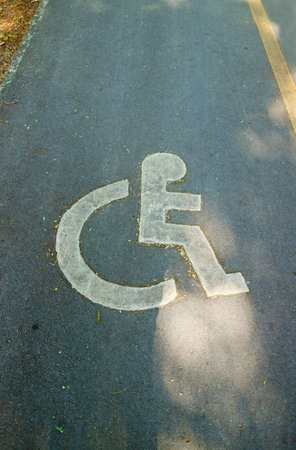 Sign of Disabled Person Wheel Chair Accessibility on the Laneの写真素材