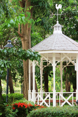 White Wooden Gazebo in the Gardenの写真素材