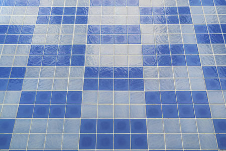 Blue mosaic tiled floor of swimming pool before water fillingの写真素材