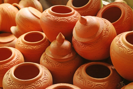 Heap of orange brown unglazed terracotta water jar, famous Mon style's Koh Kret pottery, Koh Kret Island, Nonthaburi, Thailandの写真素材