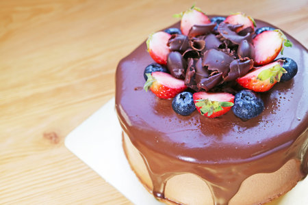 Delectable Chocolate Cake with Fresh Strawberry and Blueberryの写真素材
