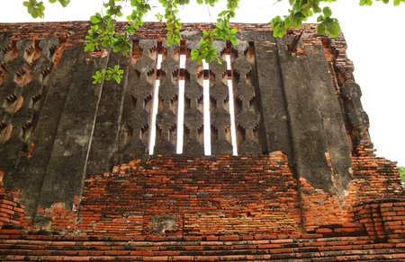 Remain of the Royal Vihara's Window of Wat Mahathat Temple in Ayutthaya Historical Park, Thailandの写真素材
