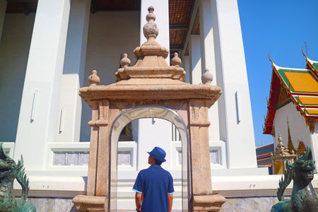 Visitor Entering to Wat Pho or Temple of the Reclining Buddha, the Birthplace of Traditional Thai Massage, Bangkok Old City, Thailandの写真素材