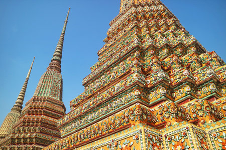 Three of The Fore Large Stupas Calls Phra Maha Chedi Si Rajakarn, Dedicated to the First Four Kings of Chakri Dynasty, Located in Wat Pho Temple, Bangkok, Thailandの写真素材