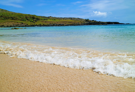 Amazing Anakena Beach with Splashing Waves from Bright Blue Pacific Ocean, Easter Island, Chile, South Americaの写真素材