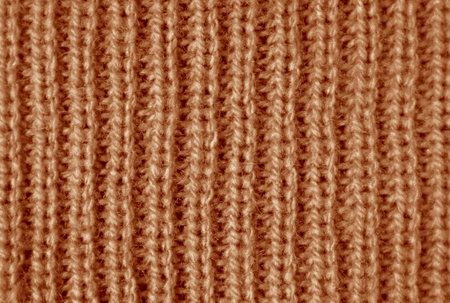 Closeup the Texture of Mocha Mousse Knitted Wool Fabric in Vertical Patternsの写真素材