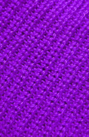 Closeup the Texture of Purple Knitted Wool Fabric in Diagonal Patternsの写真素材