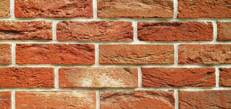 Front View of Grunge Brick Wall for Abstract Backdrop or Bannerの写真素材