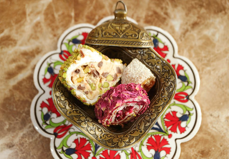 Closeup of Delectable Pistachio and Rose Petals Turkish Delightsの写真素材