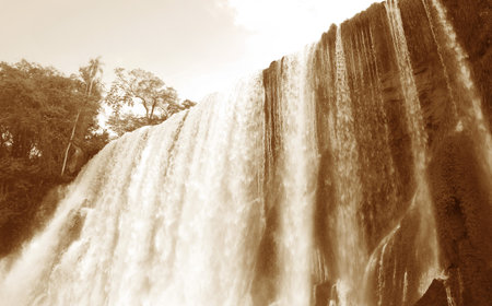 Sepia Torrent of Iguazu Falls at Argentinian side, UNESCO World Heritage in Puerto Iguazu,...