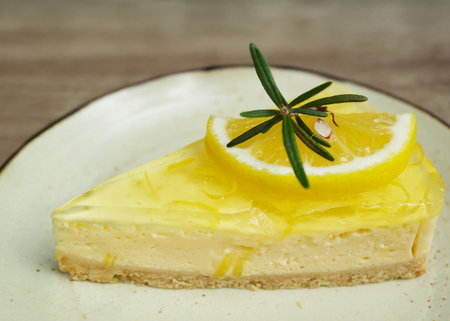 Closeup of a slice of mouthwatering lemon cream cheese pieの写真素材