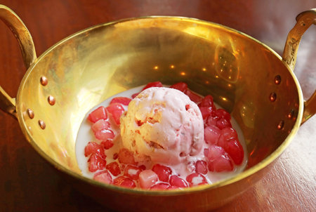 Popular Thai dessert called Tub Tim Grob or Mock Pomegranate in Sweetened coconut milk and ice creamの写真素材