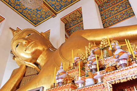 Phraphutthasiyard, gorgeous Reclining Buddha image in the image hall of Wat Ratchaorasaram, Bangkok, Thailandの写真素材